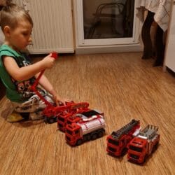 a boy playing with toys