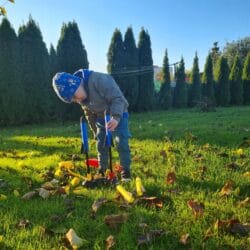 a child playing with a toy in the grass