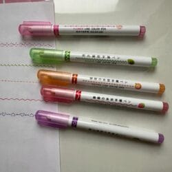 a group of colorful markers