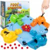 Arkadna družabna igra Hungry Hippos s pisanimi lačnimi povodnimi konji in kroglicami.